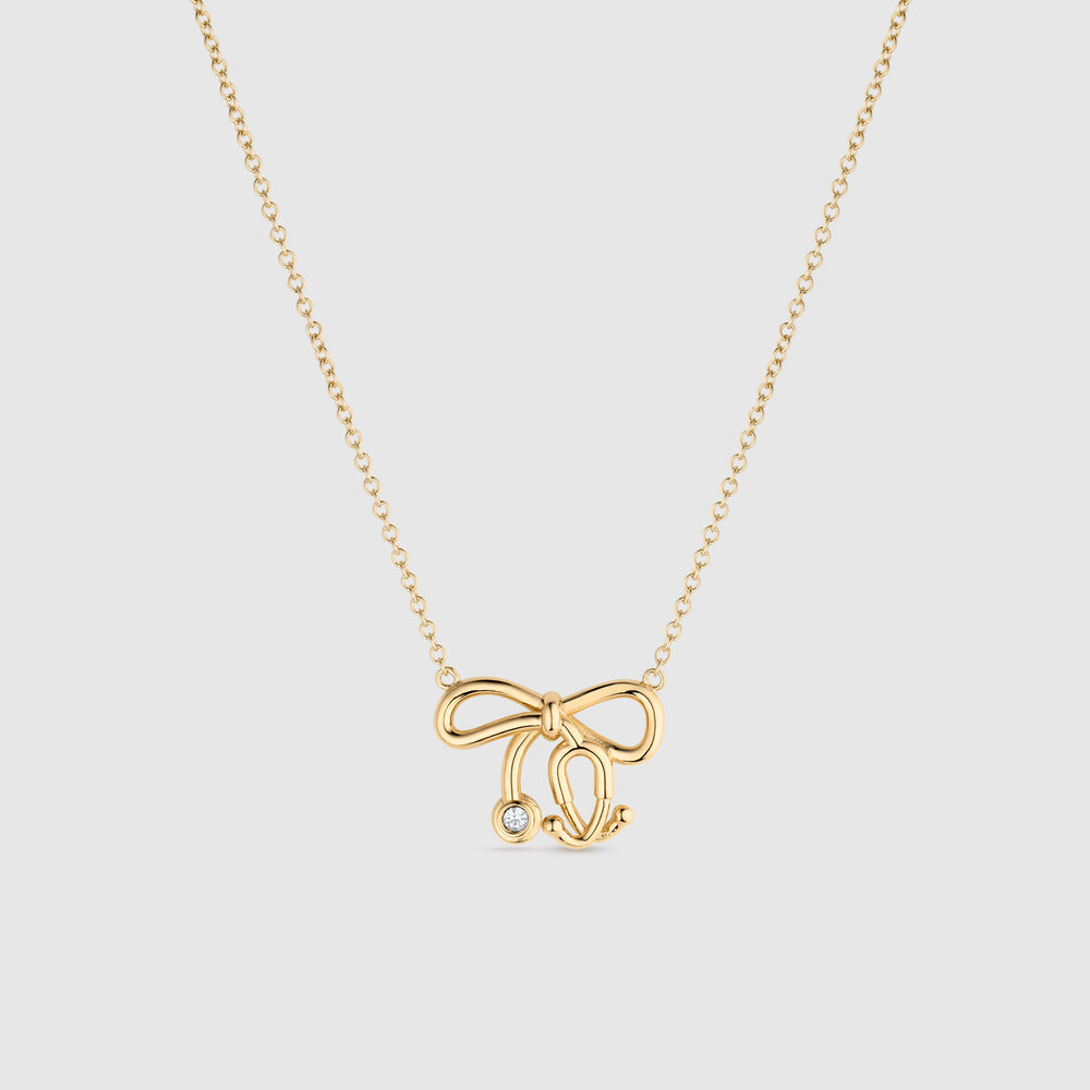 Gold Stethoscope Bow Necklace