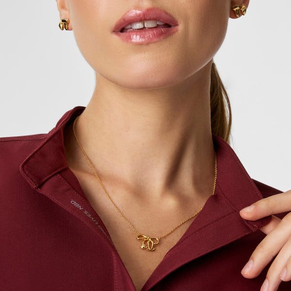 Gold Stethoscope Bow Necklace