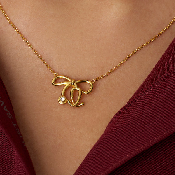 Gold Stethoscope Bow Necklace